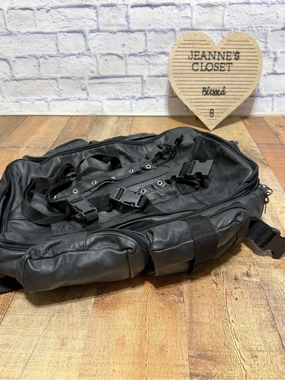 Heavy Duty Black Leather Motorcycle Backpack  Pre owned good condition.. there i